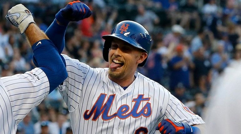 Jeff McNeil #6 of the  Mets celebrates his leadoff home...