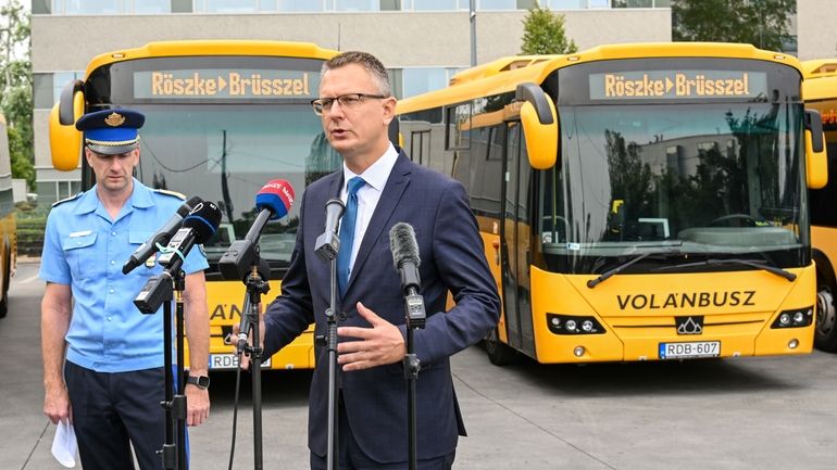 Hungary's State Secretary Bence Rétvári, right, and National Deputy Chief...