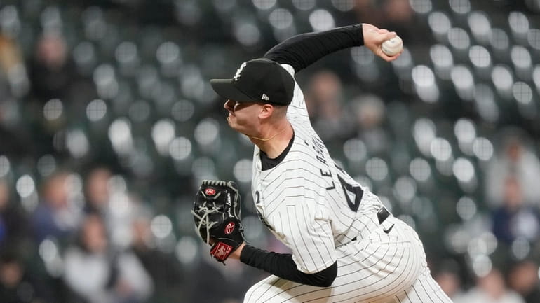 Chicago White Sox relief pitcher Jordan Leasure delivers during the...