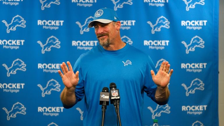 Detroit Lions head coach Dan Campbell addresses the media after...