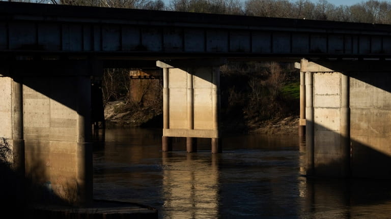 The Trinity River is seen near where law enforcement found...