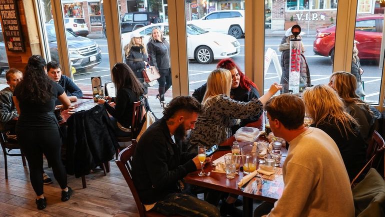 Patrons enjoy the atmosphere of Gallo Columbian Restaurant in Patchogue.