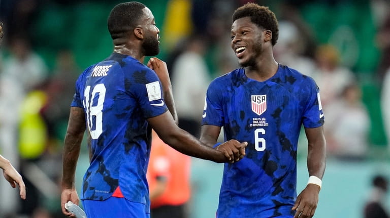 United States' Shaq Moore (18) and Yunus Musah celebrate after...