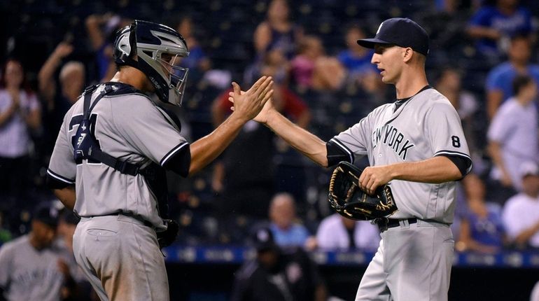 Gary Sanchez #24 and Chasen Shreve #45 of the New...