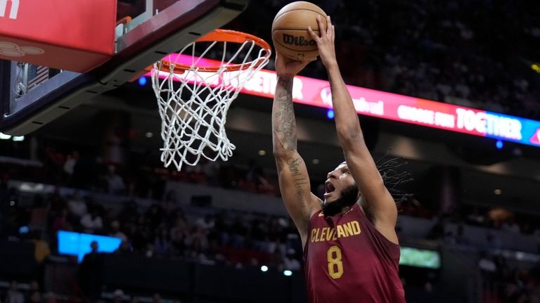 Cleveland Cavaliers forward Lamar Stevens dunks the ball during the...