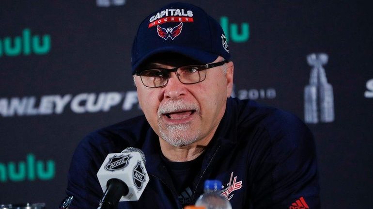 Capitals head coach Barry Trotz speaks while answering questions from...