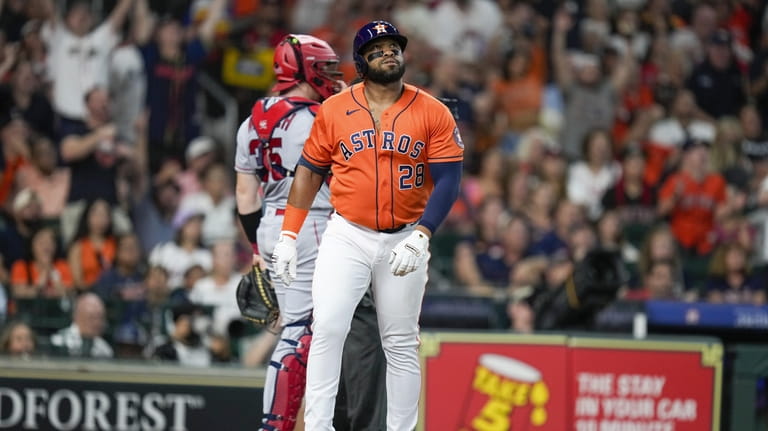 Singleton homers twice to lead Astros over Angels 11-3