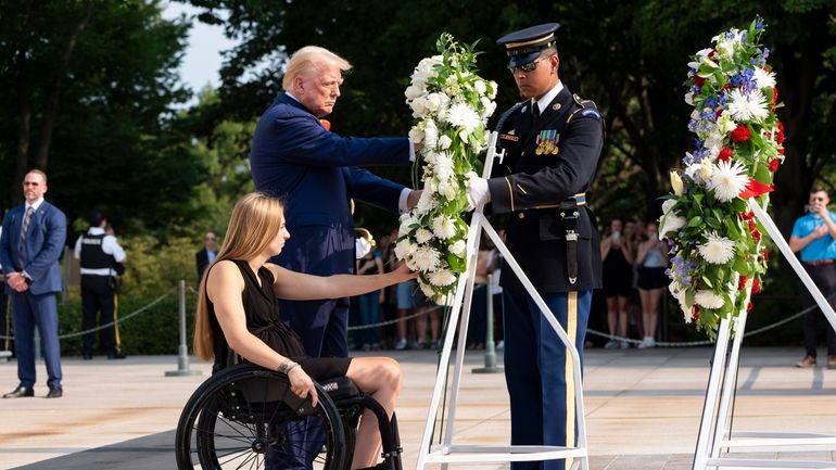 Former U.S. Marine Corps Cpl. Kelsee Lainhart left, and Republican...