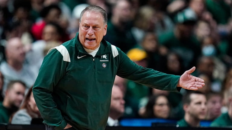 Michigan State head coach Tom Izzo questions a call as...