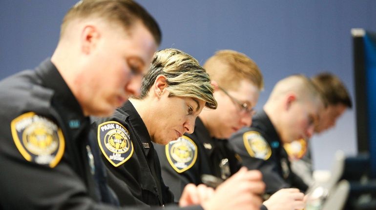 Town of Islip Park Rangers include, from left, Christopher Kotak...