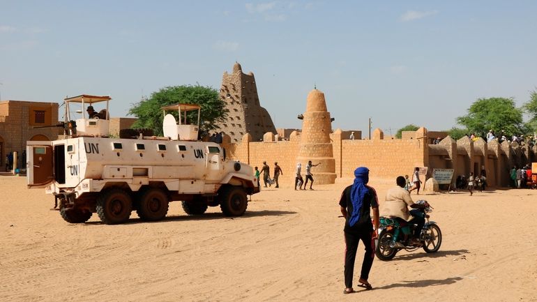 United Nation forces patrol the streets of Timbuktu, Mali, Sunday,...