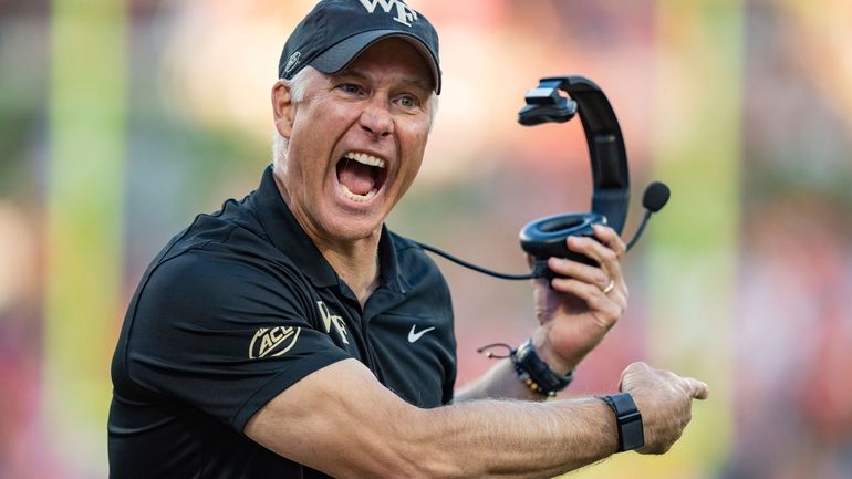 Wake Forest head coach Dave Clawson reacts during the second...