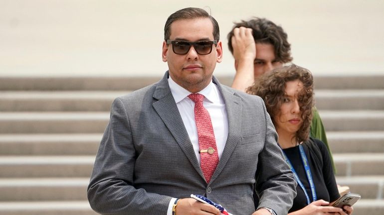 Rep. George Santos outside federal court in Central Islip on June...