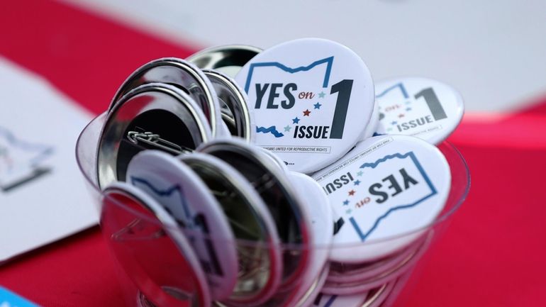 Buttons in support of Issue 1, the Right to Reproductive...