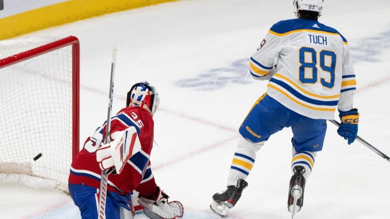 Buffalo Sabres' Alex Tuch (89) scores on Montreal Canadiens goaltender...