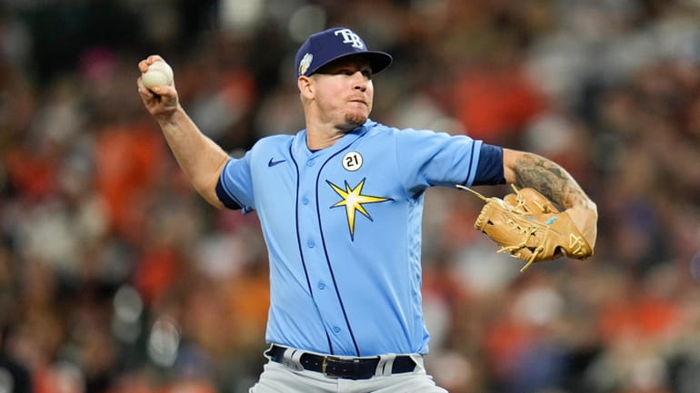 FILE -Tampa Bay Rays relief pitcher Chris Devenski throws in...