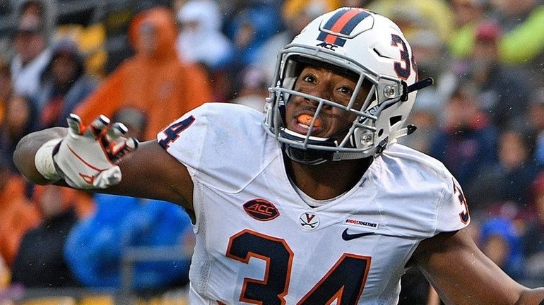 Jester Weah of the Pittsburgh Panthers cannot make a catch while...