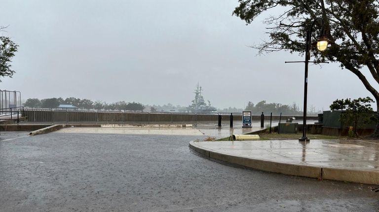 Flooding on Water Street near Princess in downtown Wilmington, N.C.,...