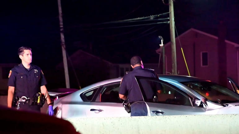 Suffolk County police on the scene of a crash on...