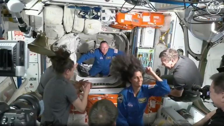 NASA astronauts Butch Wilmore and Suni Williams are welcomed by...