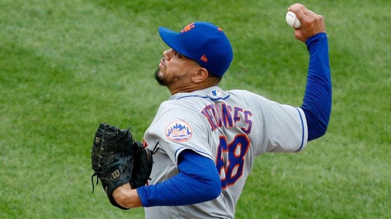 Dellin Betances of the Mets pitches against the Yankees in Game 1...