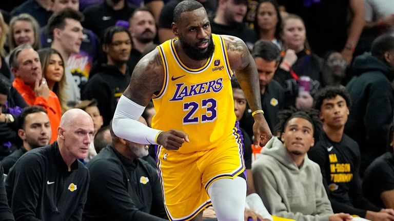 Los Angeles Lakers forward LeBron James (23) runs up court...