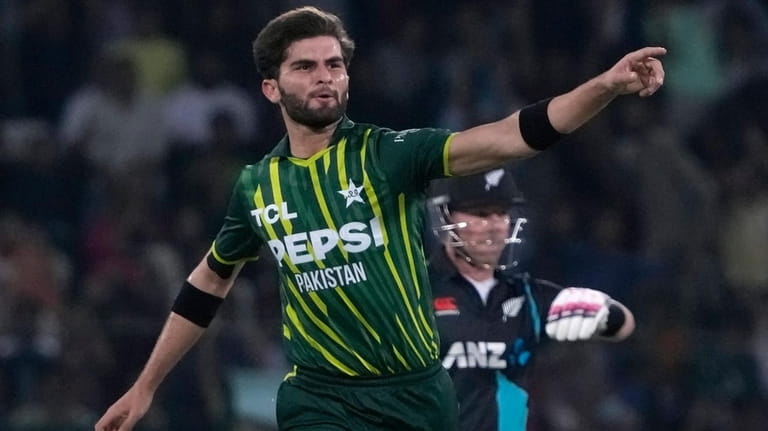 Pakistan's Shaheen Shah Afridi celebrates after taking the wicket of...