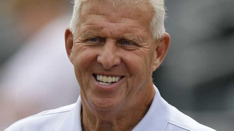 Retired NFL football coach Bill Parcells watches batting practice before...