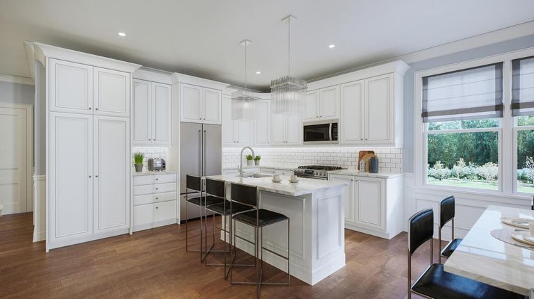 The kitchen in the lower unit at the condominiums at...