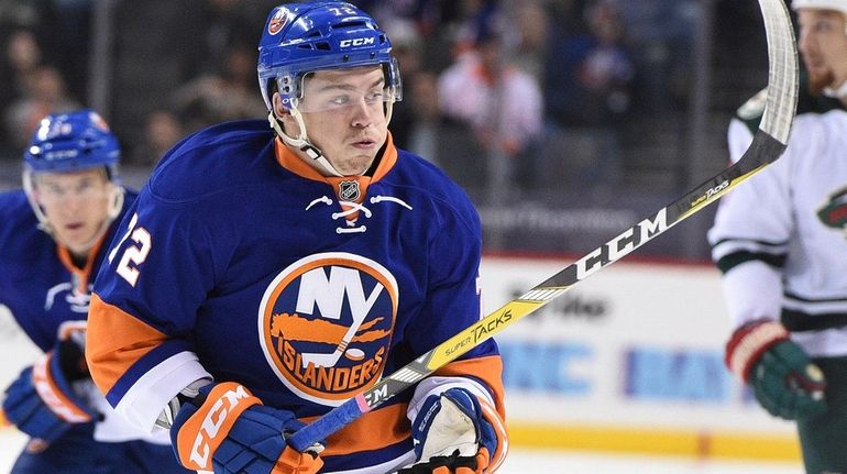 New York Islanders left wing Anthony Beauvillier skates against the...