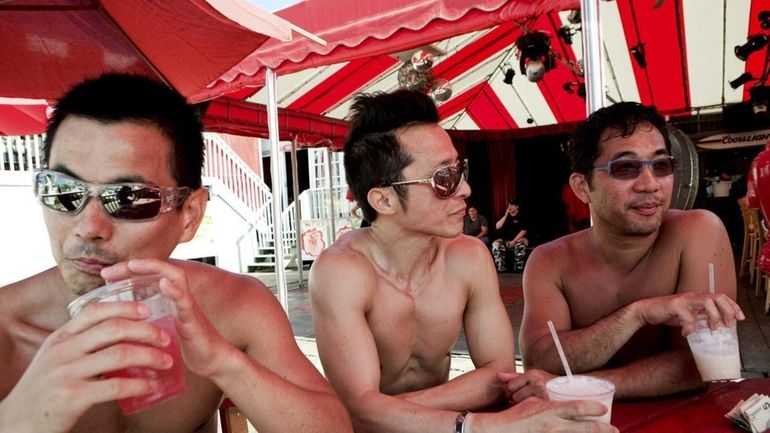 A few Japanese friends enjoy cold drinks during the warm...