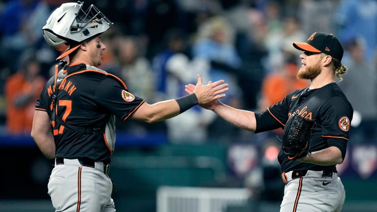 Baltimore Orioles catcher James McCann and relief pitcher Craig Kimbrel...