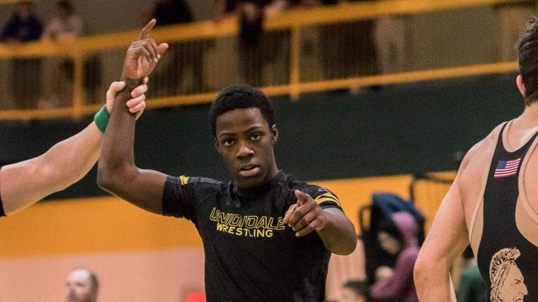 Uniondale's Xavier Pommells celebrates during the Nassau Division I semifinals held at...