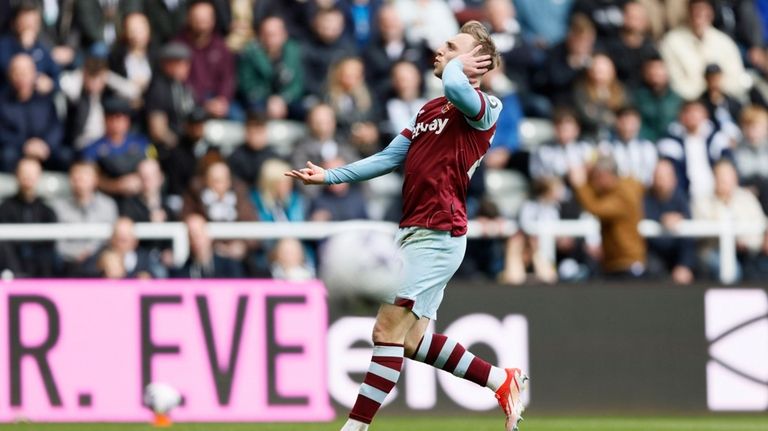 West Ham United's Jarrod Bowen celebrates scoring his side's third...