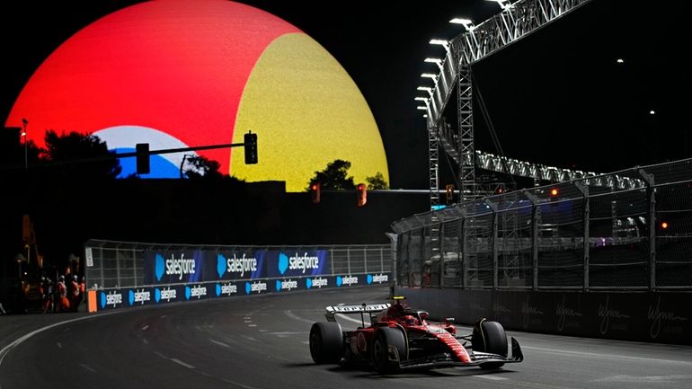 Ferrari driver Carlos Sainz, of Spain, races during the final...