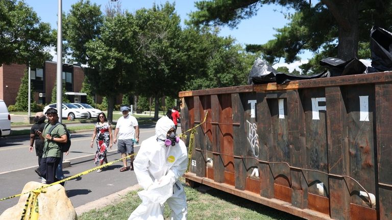 Cleanup continues at the Ammann Hall dormitory on the Stony...