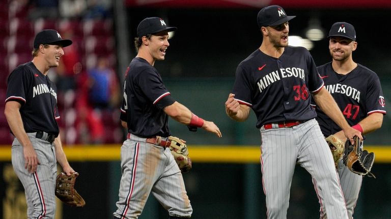 Minnesota Twins' Andrew Stevenson, from left to right, Max Kepler,...