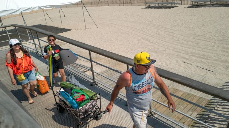 Heily Ramos, 10, of New Hyde Park, with her dad...