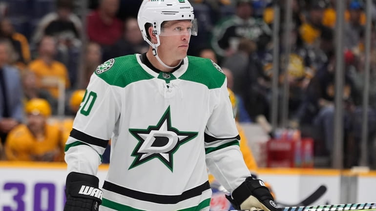 Dallas Stars' Ryan Suter (20) waits for play during the...