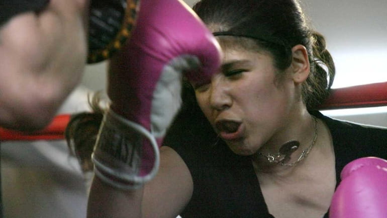 Dilsia Bonilla, 13, trains at PAL boxing gym in Westbury....