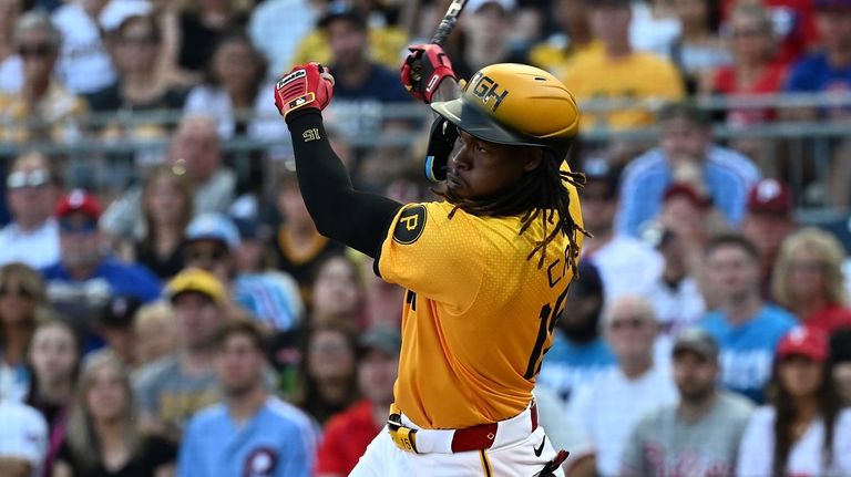 Pittsburgh Pirates' Oneil Cruz hits an RBI double in the...