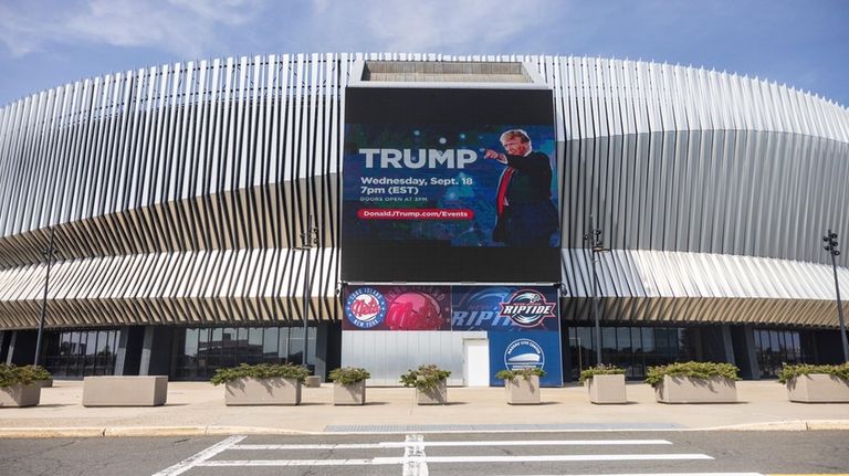 Nassau Coliseum on Monday displays an advertisement for Trump's rally.