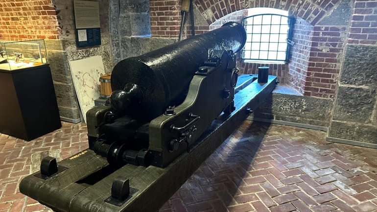 A howitzer on display at the Harbor Defense Museum in...