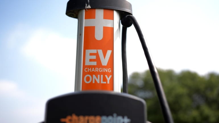An EV charging station is seen Thursday, May 9, 2024,...