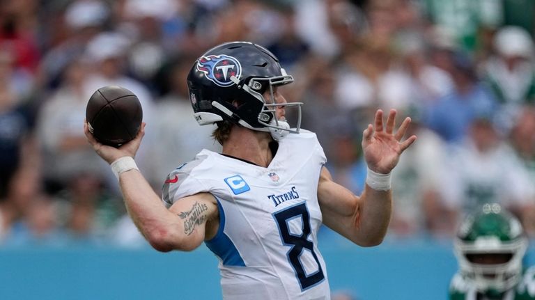 Tennessee Titans quarterback Will Levis (8) sets back to pass...