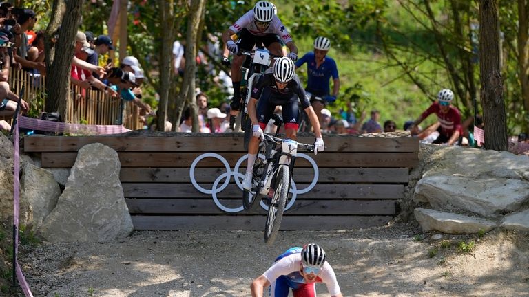 Victor Koretzky, of France, bottom centre, leads Thomas Pidcock, of...