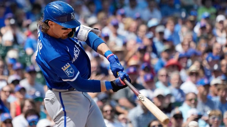 Kansas City Royals' Bobby Witt Jr., hits a single during...