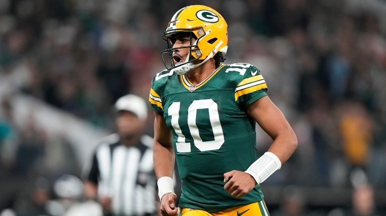 Green Bay Packers quarterback Jordan Love (10) reacts during the...