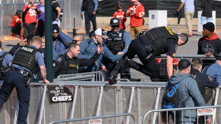 Law enforcement personnel clear the area around Union Station following...