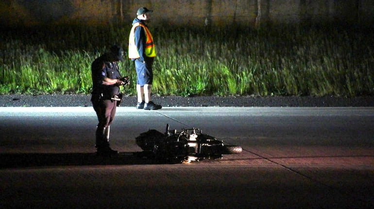 Police investigate a motorcycle accident that occurred on Sunrise Highway in Bohemia...